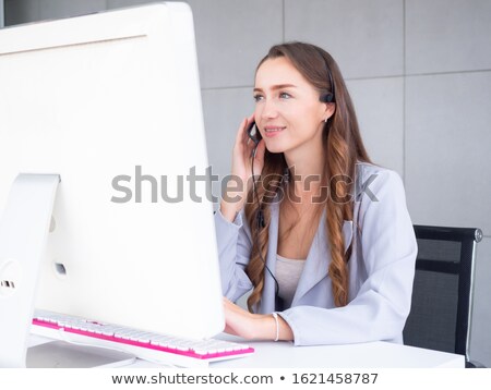 [[stock_photo]]: A Female Employee At Phone