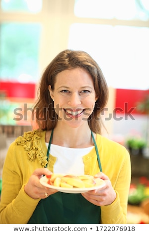 Foto d'archivio: Woman Offering Apples