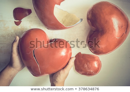 Stock fotó: Man Holding Broken Heart