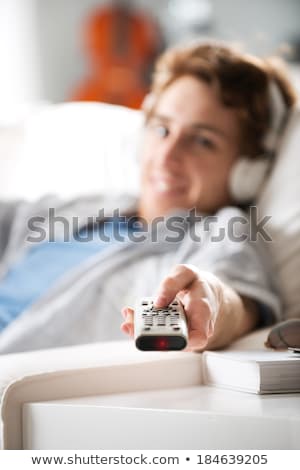 Foto stock: Guy With Stereo Remote Control