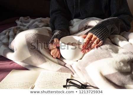 Foto stock: Female Writer Drinking Cup Of Coffee