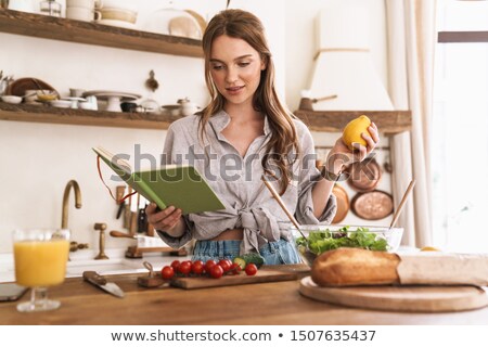 Foto stock: Young Pretty Woman Holding Lemon