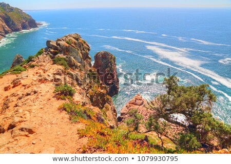Stok fotoğraf: Rocky Mountains In Sea At Portuguese Coast