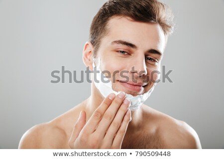 Stock fotó: Close Up Portrait Of A Smiling Man Shaving His Beard