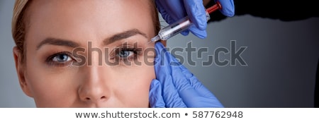 Foto stock: Woman Is Getting Botox Injection Anti Aging Treatment And Face Lift Cosmetic Treatment And Plastic