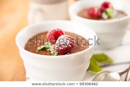 Stok fotoğraf: Pots Of Dark Chocolate Mousse With Raspberries