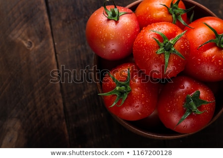 Stock foto: Dark Green Tomatoes Growing On A Cherry Tomato Plant