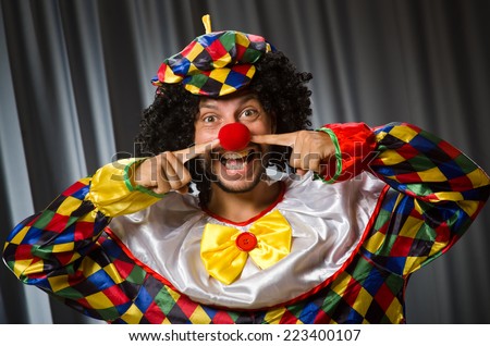 Funny Clown In Humorous Concept Against Curtain Stock fotó © Elnur