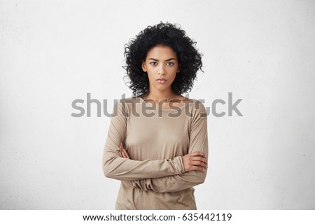 [[stock_photo]]: Cute Young Woman With Her Serious Boyfriend