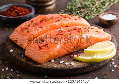 Foto stock: Raw Salmon Fillet On Board