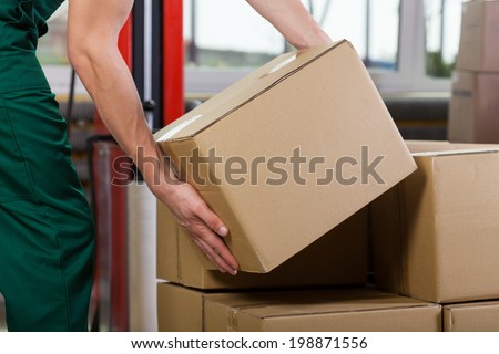 Stock fotó: Mans Hand With Cardboard Box