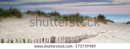 Stock photo: Panorama Landscape Of Sand Dunes System On Beach At Sunrise