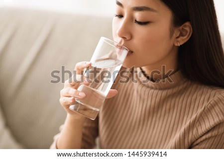 Сток-фото: Asian Woman Drinking