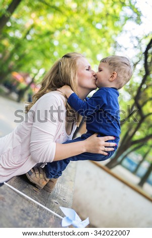 Сток-фото: Parent Touching Noses With Her Son And Smiling Happily