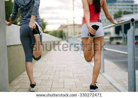 Сток-фото: Two Women Stretching Feet