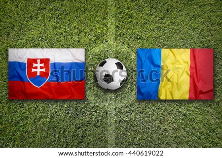 Slovakia Vs Romania Flags On Soccer Field Stok fotoğraf © kb-photodesign