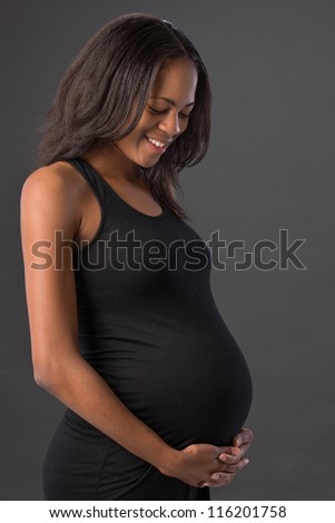 ストックフォト: Pregnant Woman With Key