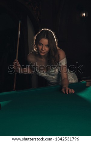 Сток-фото: Young Beautiful Young Lady Aiming To Take The Snooker Shot