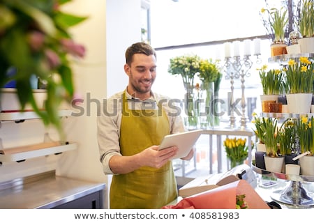 ストックフォト: Florist Man Or Seller At Flower Shop Counter