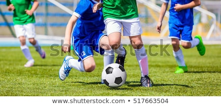 Kids Football Players Kicking Ball On Soccer Field Sports Socce ストックフォト © matimix