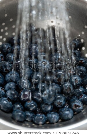 Foto stock: Blue Colander With Healthy Fresh Fruit