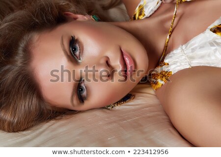 [[stock_photo]]: Beautiful Woman In Long Leopard Dress