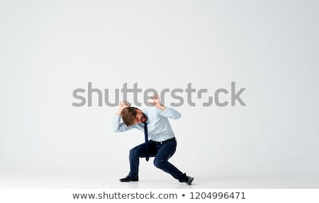 Stockfoto: Business Man Holding Something Heavy