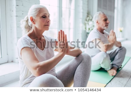 Stock fotó: Happy Senior Man And Woman Doing Yoga