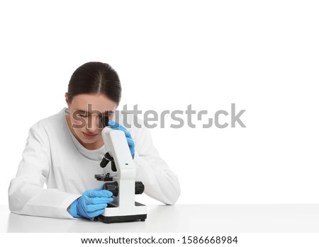 [[stock_photo]]: Woman Working With A Microscope