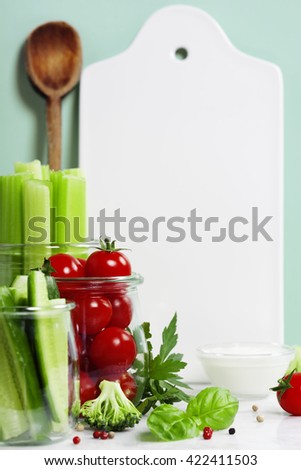 Stock photo: Assorted Fresh Vegetables With Dip And White Ceramic Serving Boa