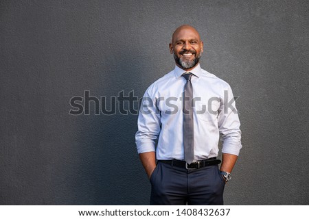 Сток-фото: Senior Businessman With Toothy Smile