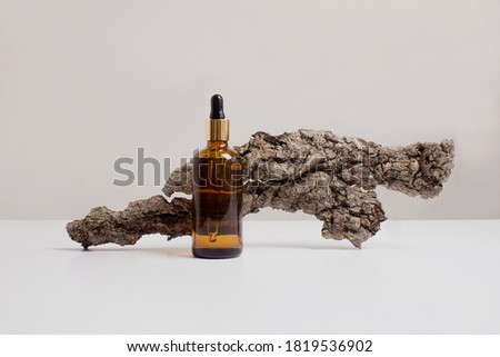 [[stock_photo]]: Glass Bottle With Body Care Fluid