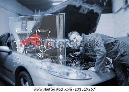 Stock photo: Mechanic With Open Hood With Futuristic Interface In Black And W