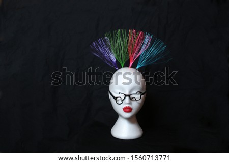 Foto stock: Mannequin With Red Lips And Black Hair