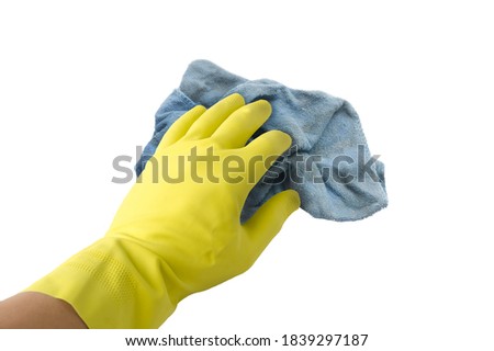 [[stock_photo]]: Female Janitor Cleaning Table With Blue Rag