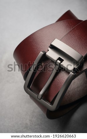 Stockfoto: Brown Stylish Mens Belts Coiled