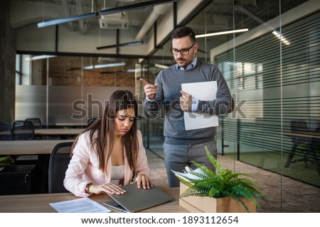 Stock photo: Young Female Employee Being Fired From Her Work