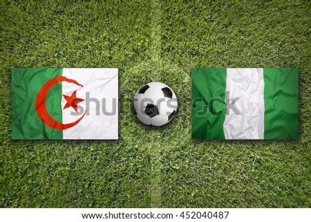 Algeria Vs Nigeria Flags On Soccer Field Stok fotoğraf © kb-photodesign
