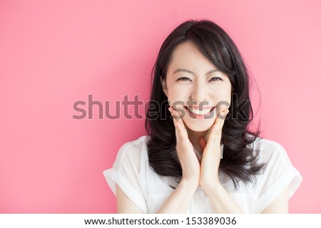 [[stock_photo]]: Portrait Of An Excited Young Asian Woman Isolated