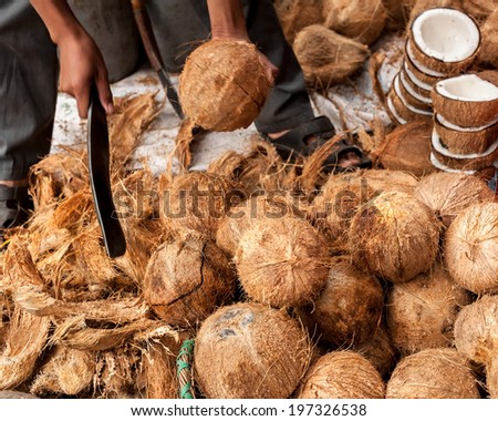 Stock fotó: Seller Opens Tropical Coconuts At Traditional Food Marketplace
