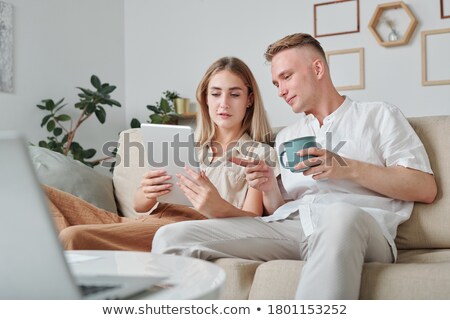 ストックフォト: Good Looking Man Holding His Wife At Home