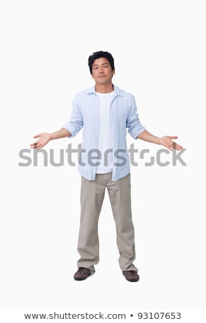 Stock photo: Clueless Young Man Against A White Background