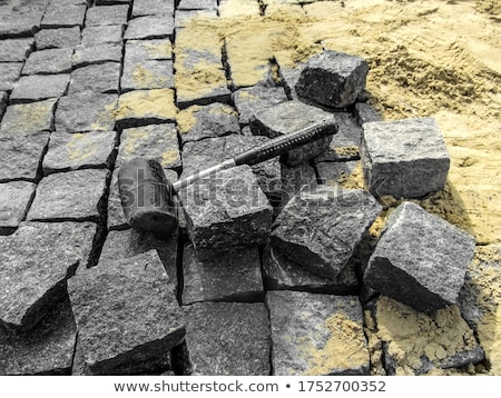 Foto stock: Paving Works With New Granite Stones