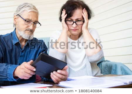 ストックフォト: Business Man Looking Shocked On Little Woman