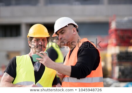 [[stock_photo]]: Civil Engineer Using Smartphone