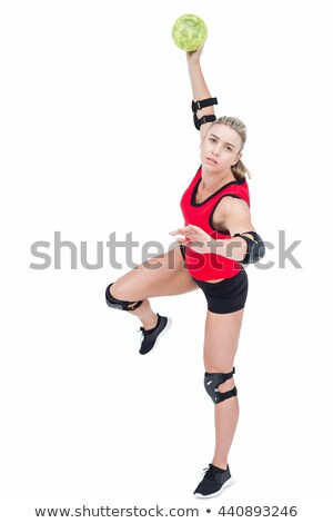 ストックフォト: Female Athlete With Elbow Pad Throwing Handball