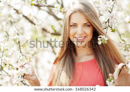 [[stock_photo]]: Beauty Face Of The Young Beautiful Woman With Flower Natural Sk