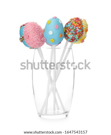 Stockfoto: Easter Eggs Of Different Colors And Cake