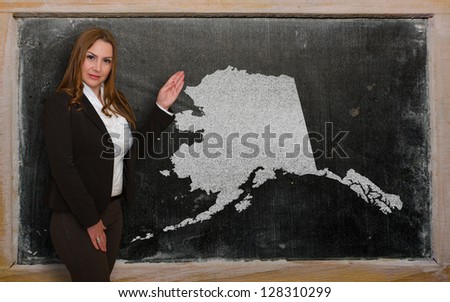 Teacher Showing Map Of Alaska On Blackboard [[stock_photo]] © vepar5