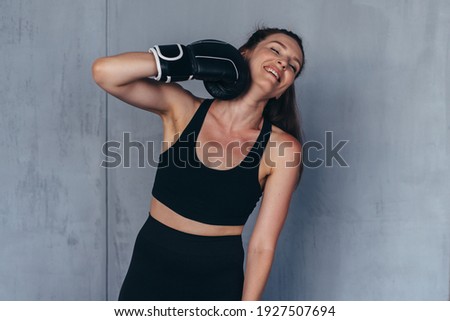 Foto stock: Young Girl Boxer Punching Herself As Self Punishment